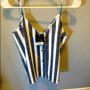 Brand new super cute tank just a little big for me